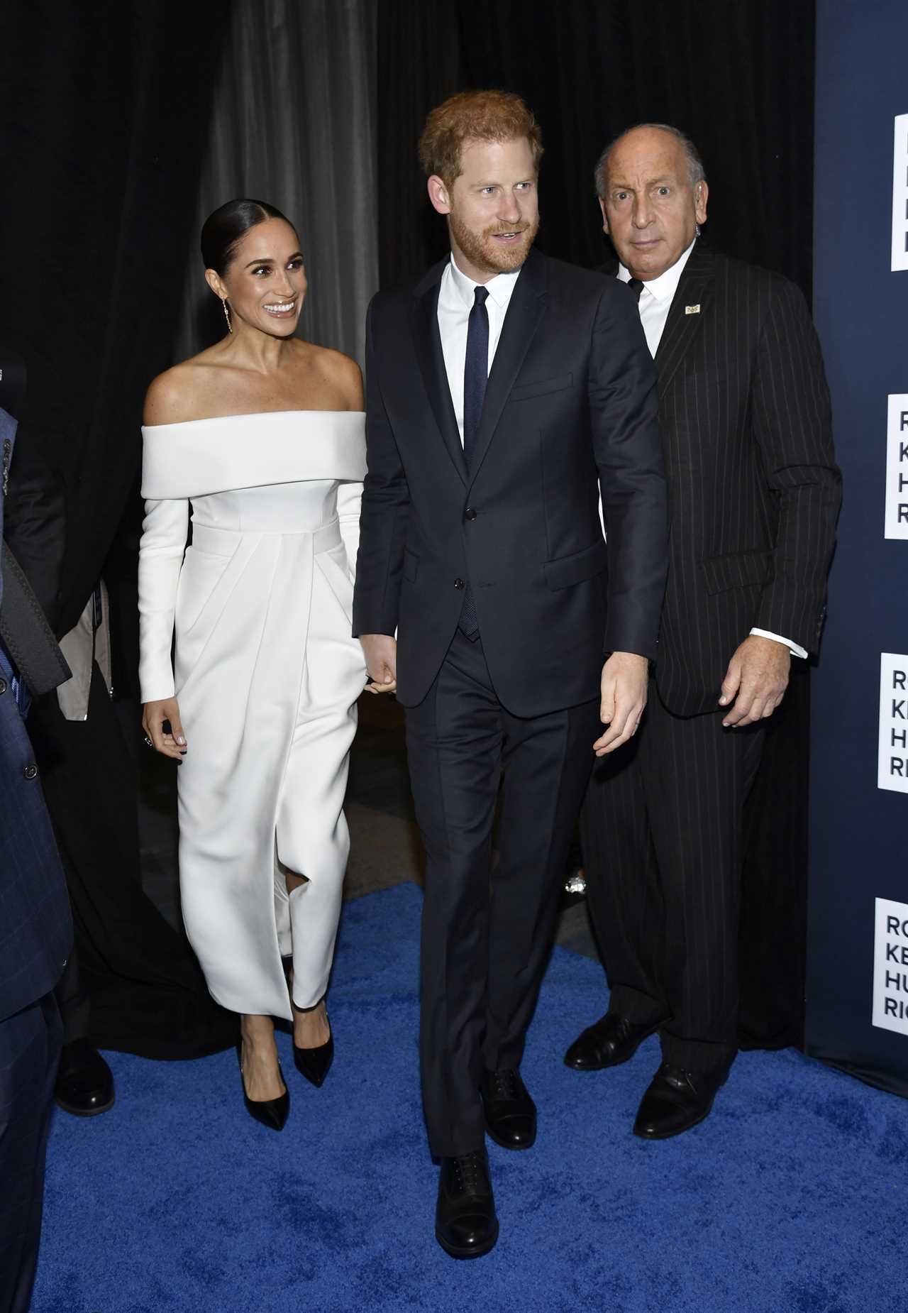 Meghan Markle wears strapless white dress to accept ‘anti-racism’ award with suited Prince Harry ahead of Netflix doc