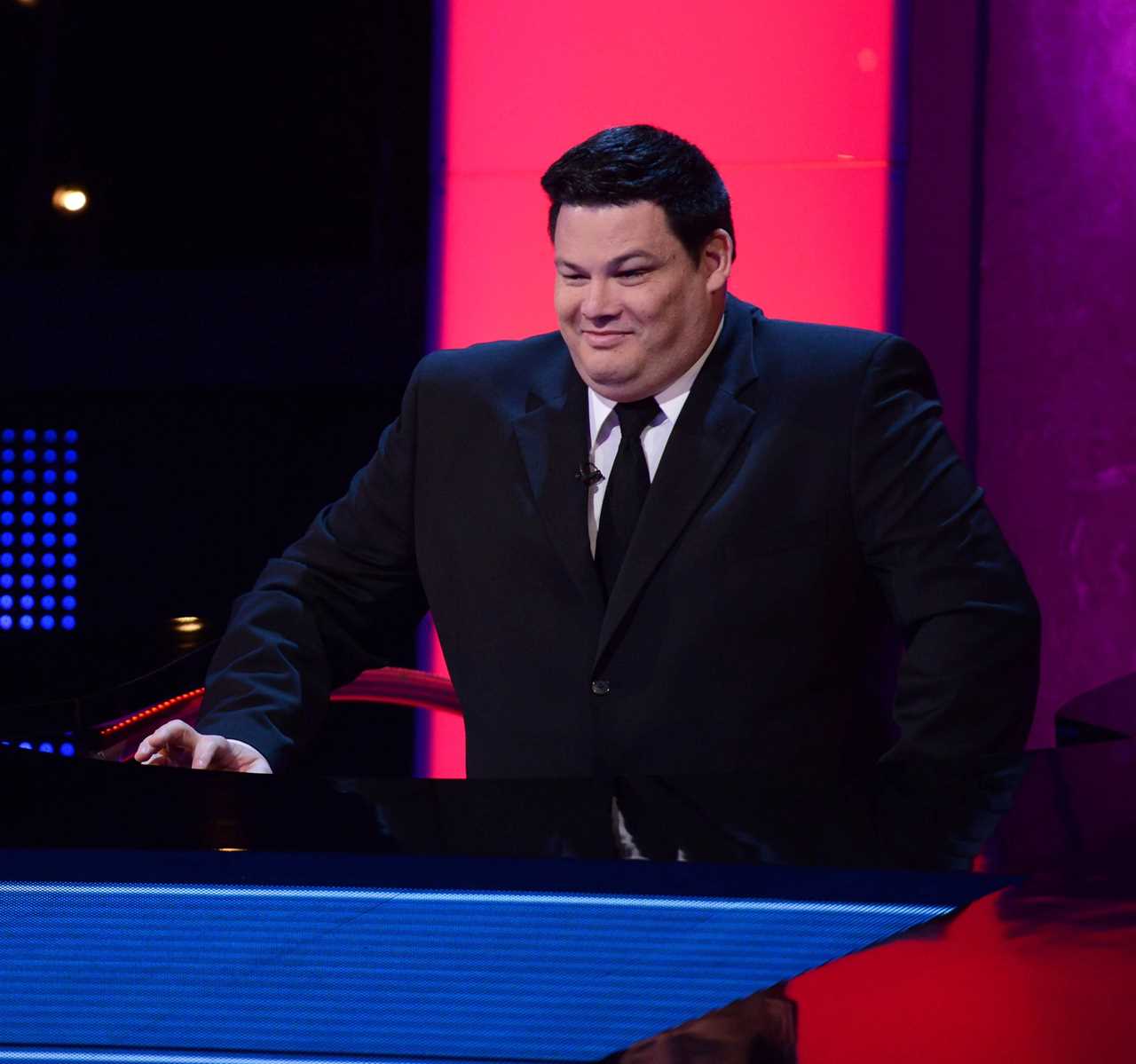 The Chase’s Mark ‘The Beast’ Labbett so slim fans don’t recognise him as he opens Christmas gift