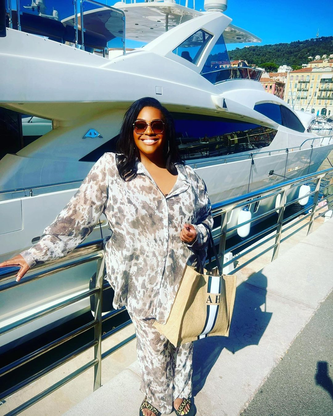 Alison Hammond looks slimmer than ever as she poses in swimsuit on a yacht