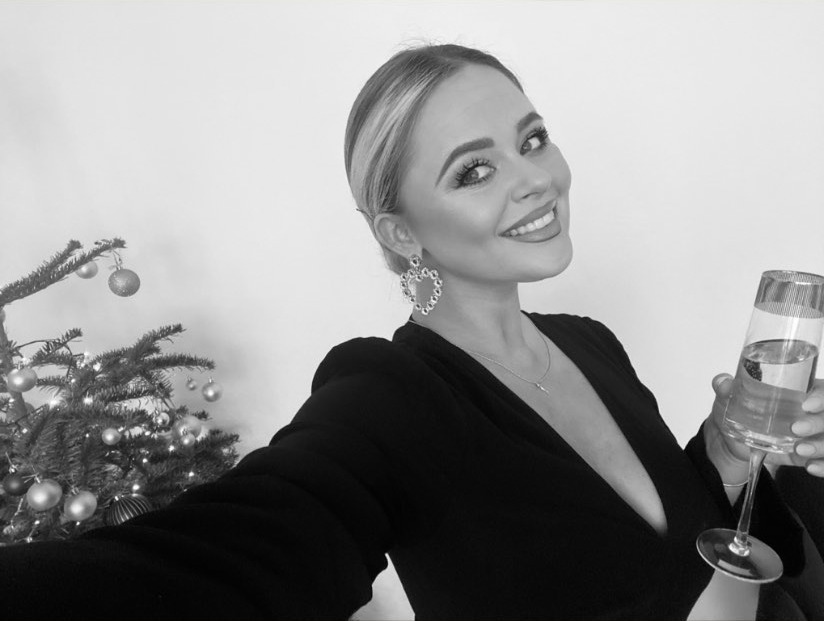 Emily Atack looks incredible as she poses in low-cut dress on Christmas Day