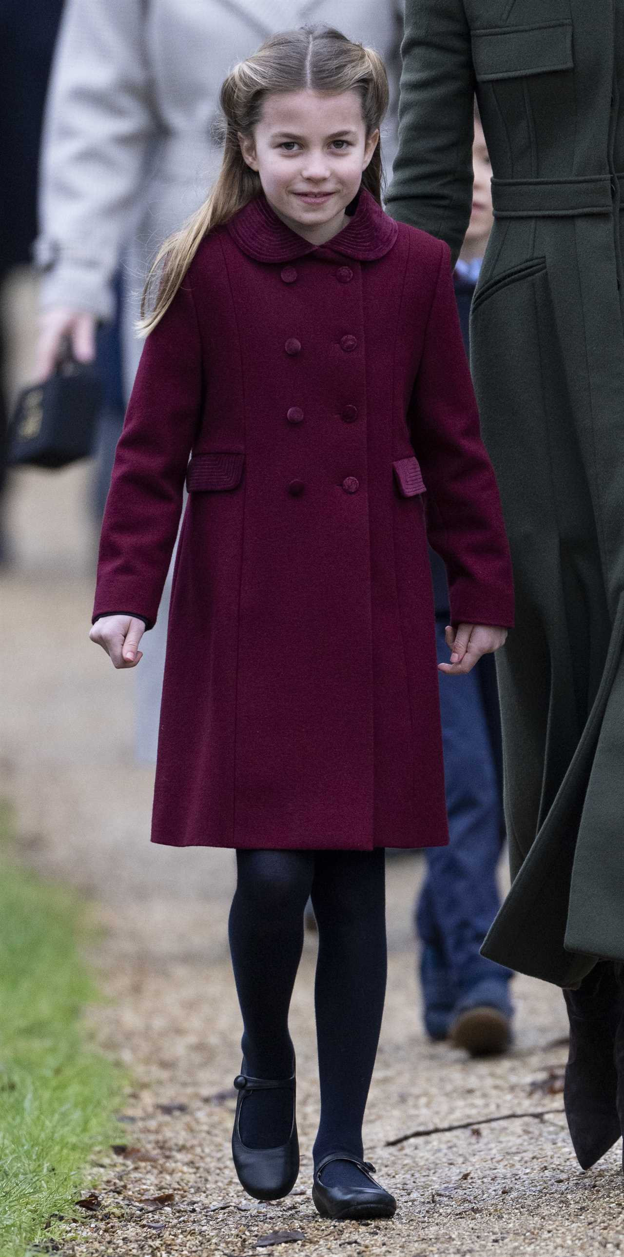 Prince Louis steals the show at Sandringham Christmas walk as delighted crowds shower him with gifts