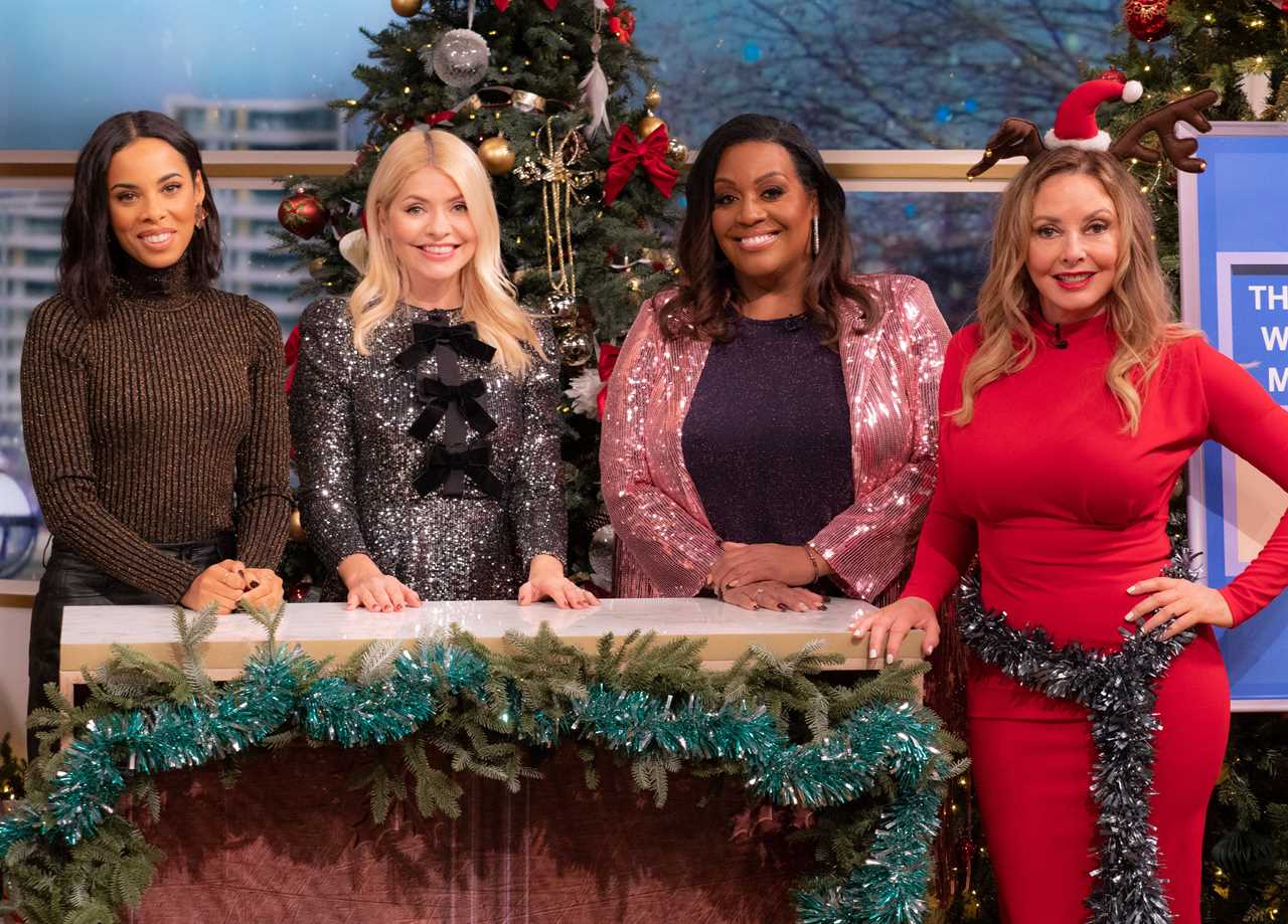 Carol Vorderman sizzles in skintight red dress for This Morning Christmas special