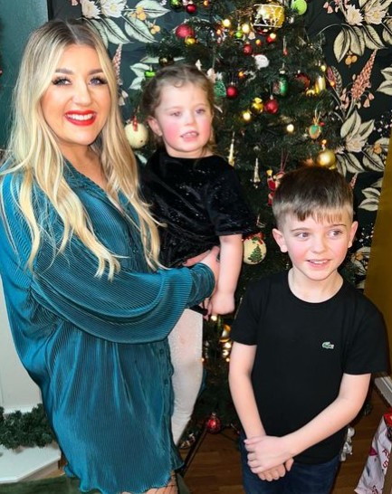 Gogglebox star Izzi Warner transforms into glam mum for Christmas snap with her kids