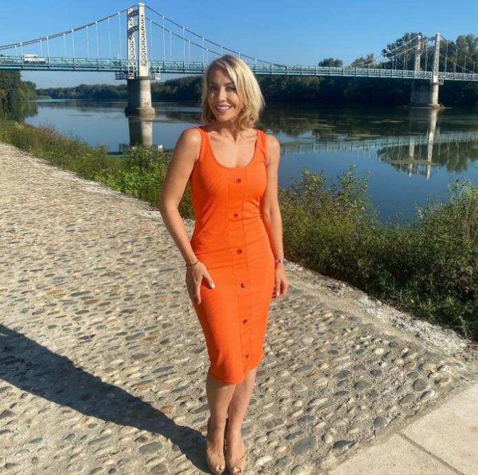 A Place In The Sun’s Laura Hamilton wows in figure-hugging orange dress