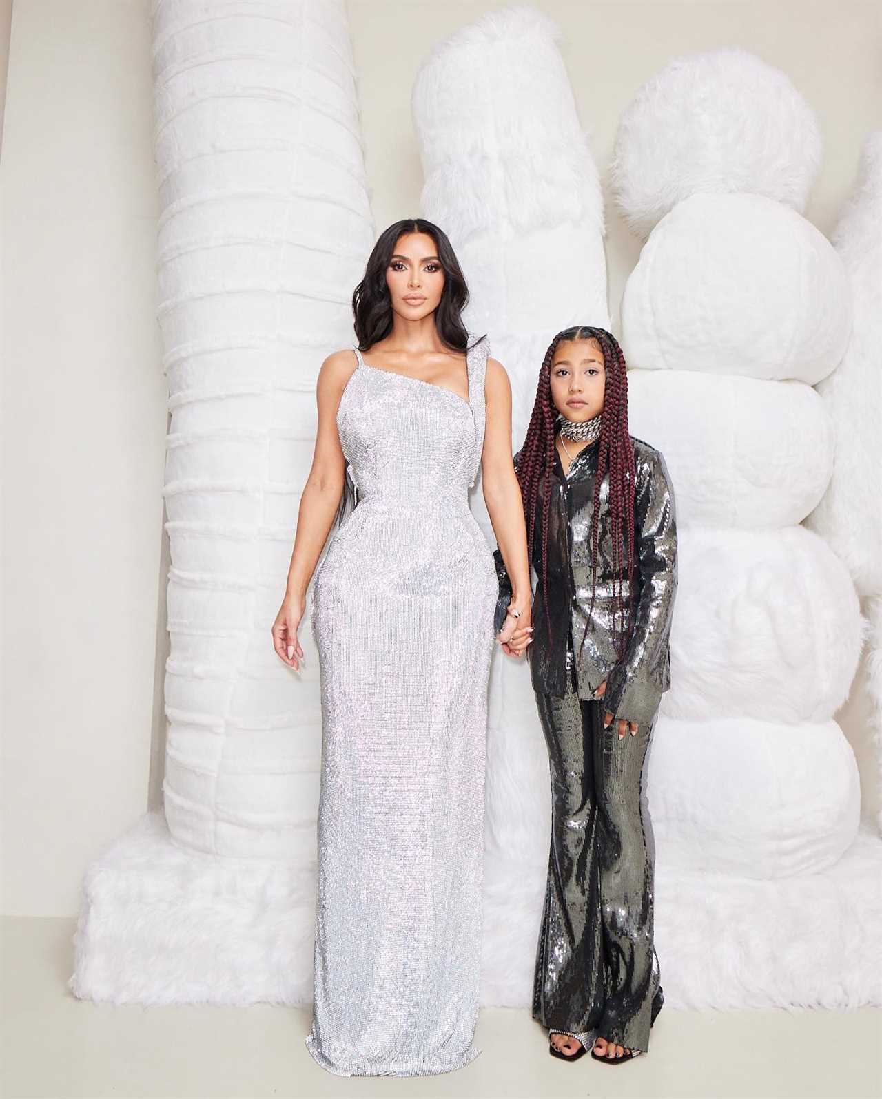 Kim Kardashian’s daughter North, 9, is almost as tall as famous mom in sky-high stilettos for new family Christmas pics