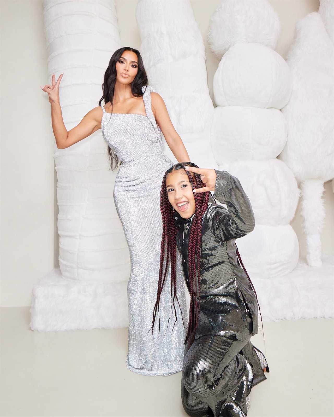 Kim Kardashian’s daughter North, 9, is almost as tall as famous mom in sky-high stilettos for new family Christmas pics