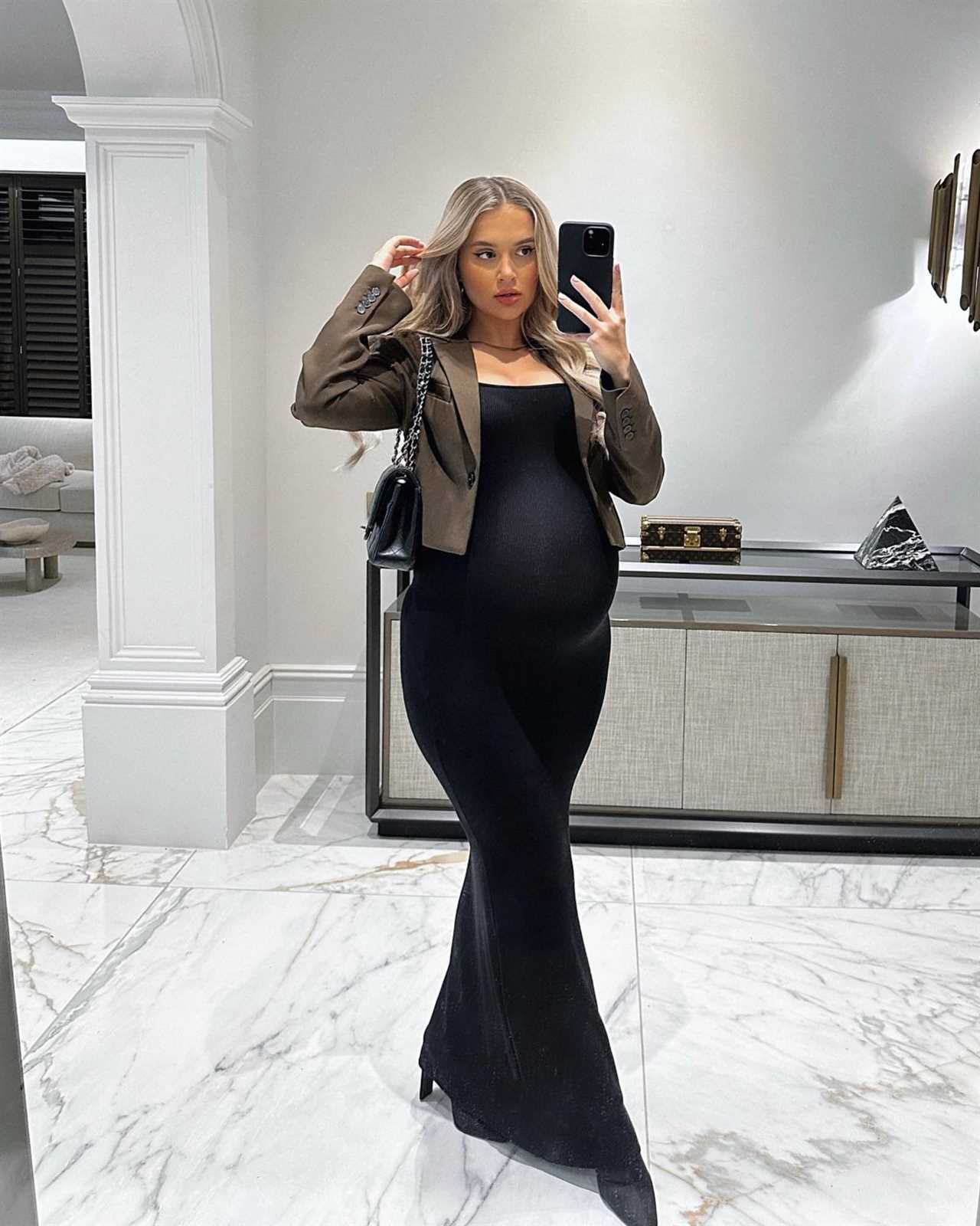 Pregnant Molly-Mae Hague shows off her huge baby bump in tight black dress for New Year’s Eve night out