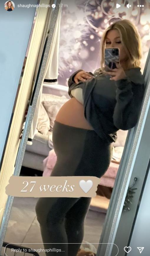 Pregnant Love Island star Shaughna Phillips shows off her 9-week ‘bump’ in throwback as she reveals severe pain