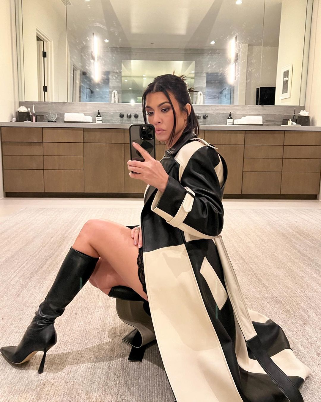 Kourtney Kardashian ‘gives fans the creeps’ as they spot weird detail in the background of sexy new photo