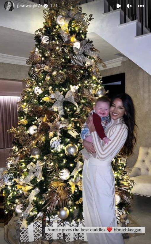 Michelle Keegan looks sensational as she cuddles up to baby nephew in unseen snaps from Christmas