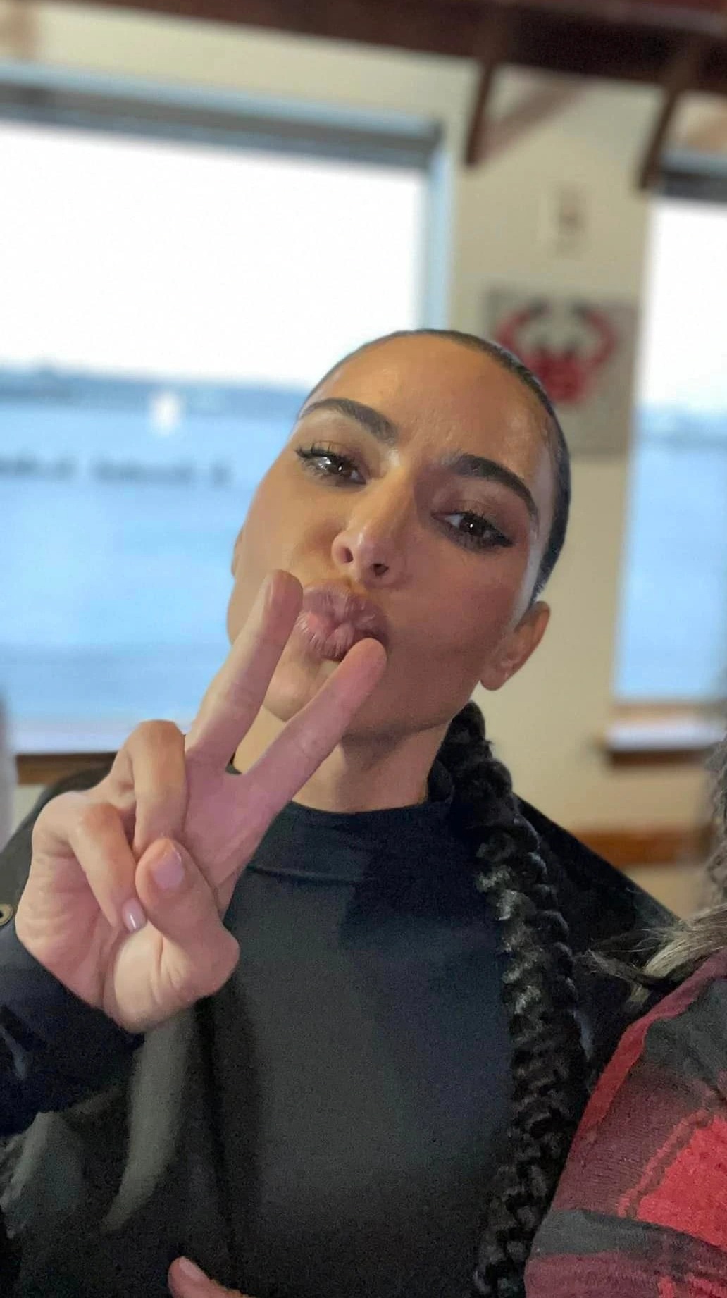 Kim Kardashian’s real skin sneakily caught on camera as fan takes new unedited photos during star’s visit to small town