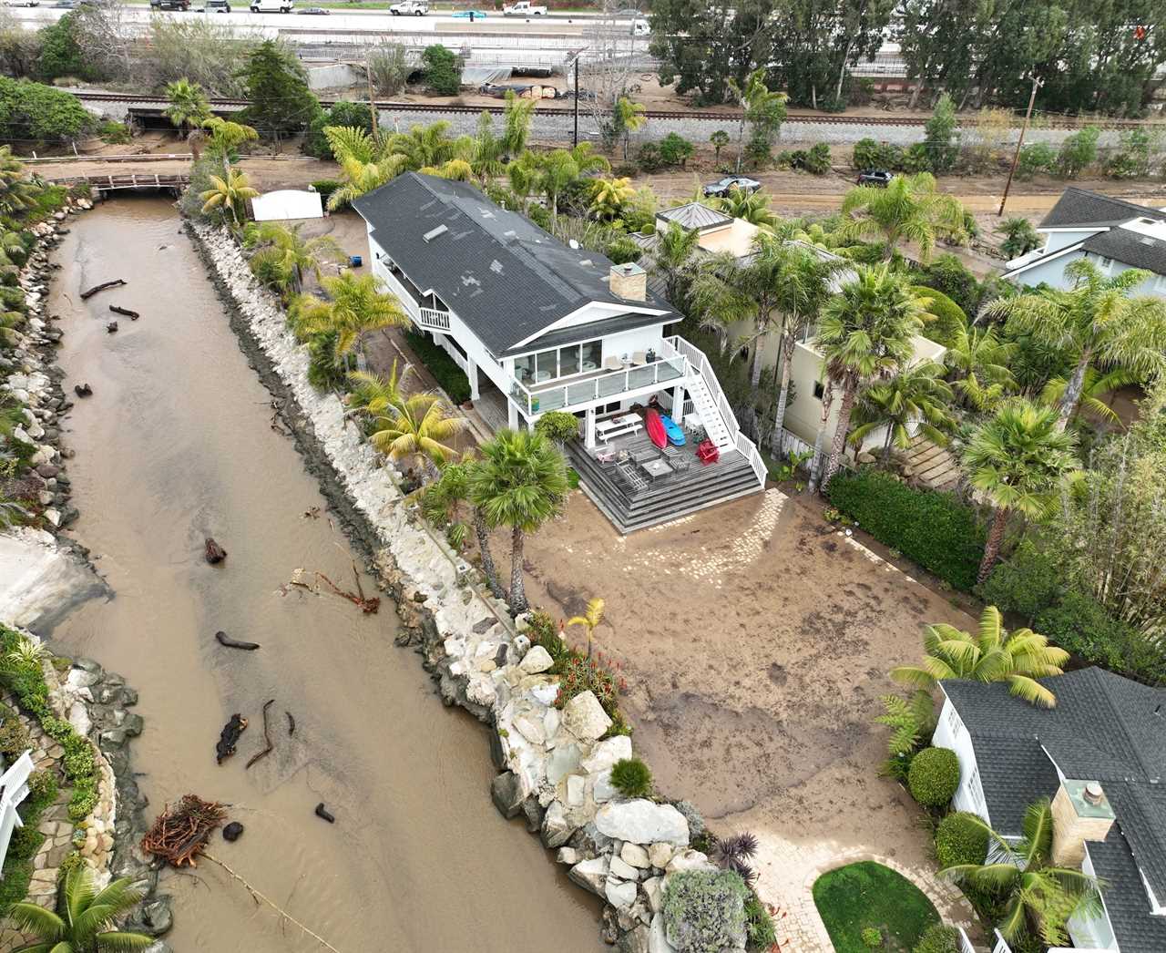 Kourtney Kardashian & Travis Barker’s $15M Santa Barbara beach house devastated by raging storm floods in scary new pics