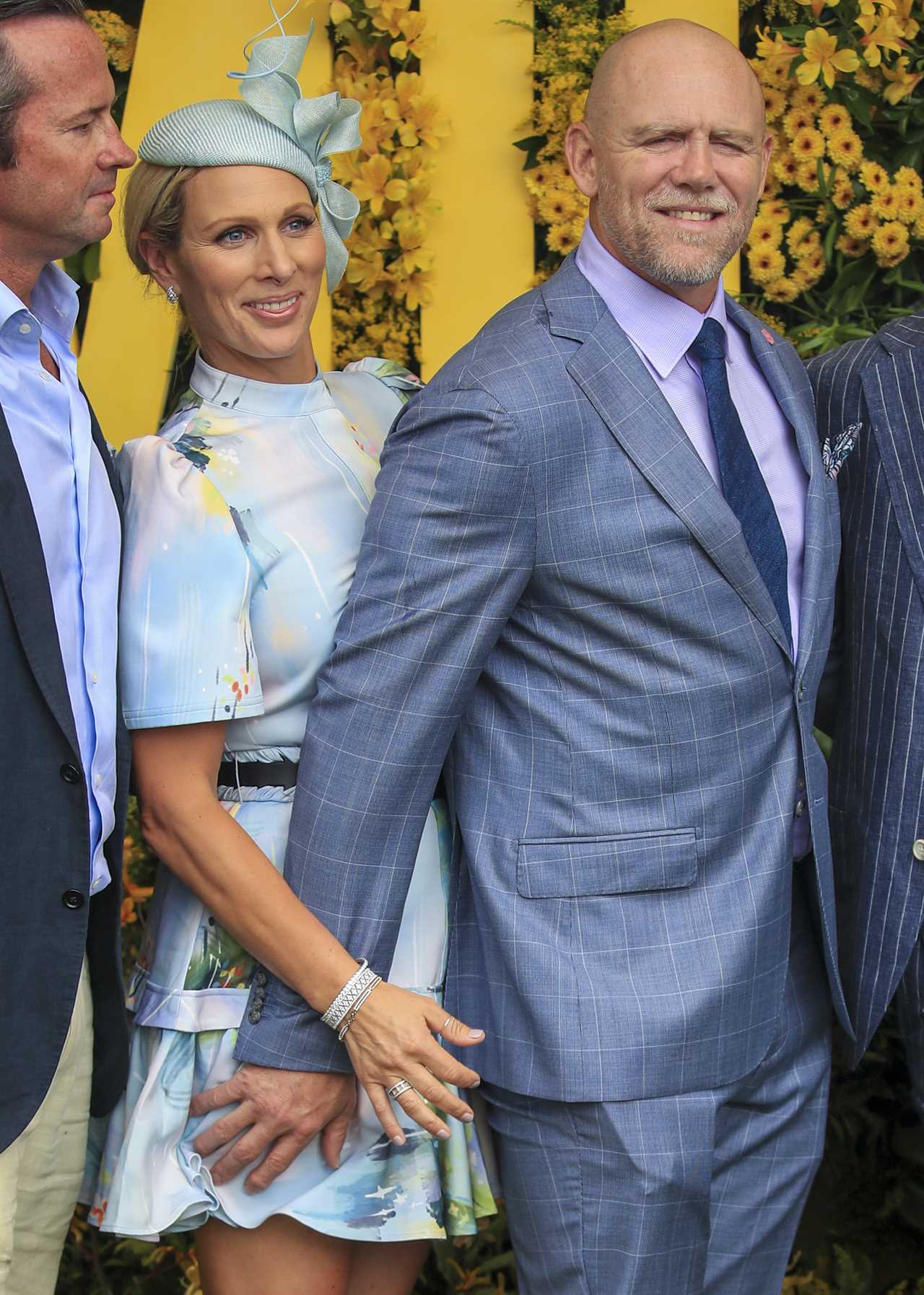 Zara and Mike Tindall put on a very PDA display as they attend the Magic Millions race day in Australia