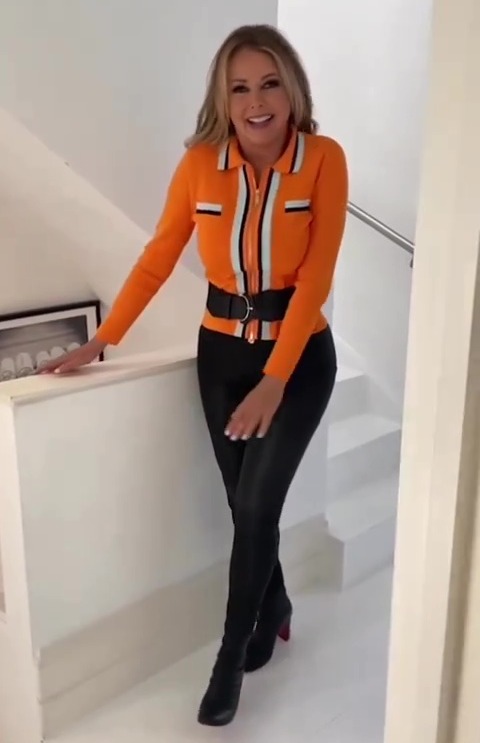 Carol Vorderman shows off curves in skintight leather trousers