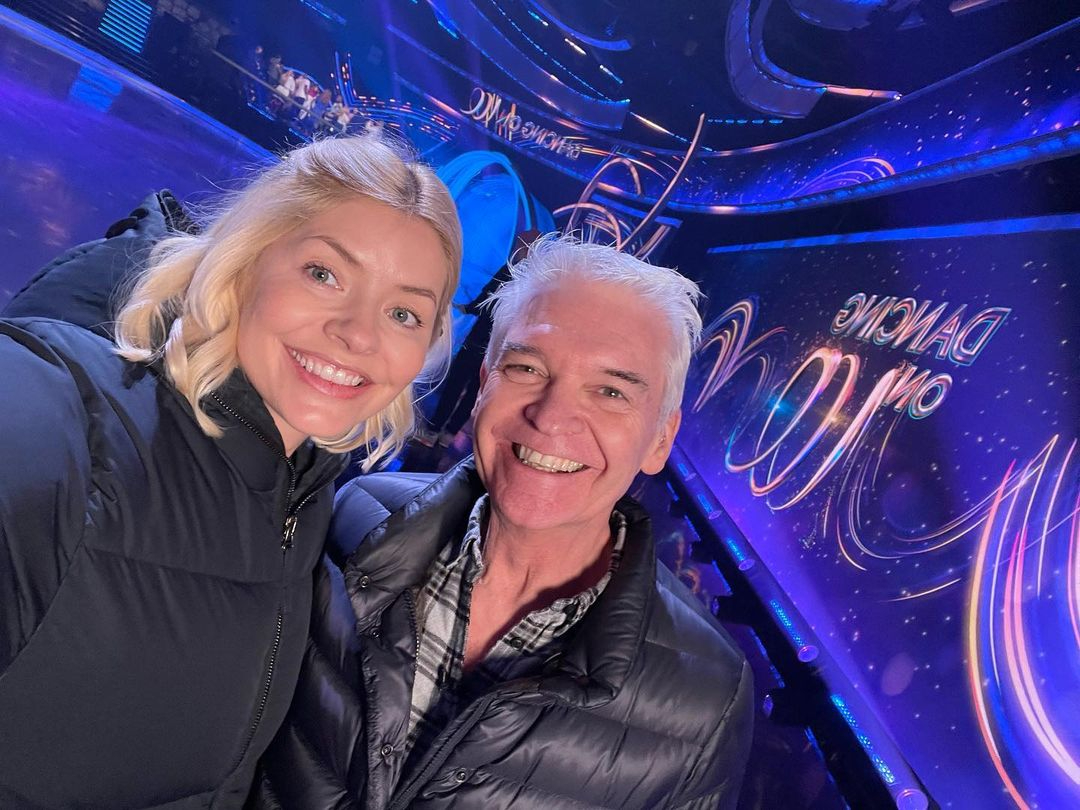 Holly Willoughby looks stunning in plunging ballgown as she returns to host Dancing on Ice