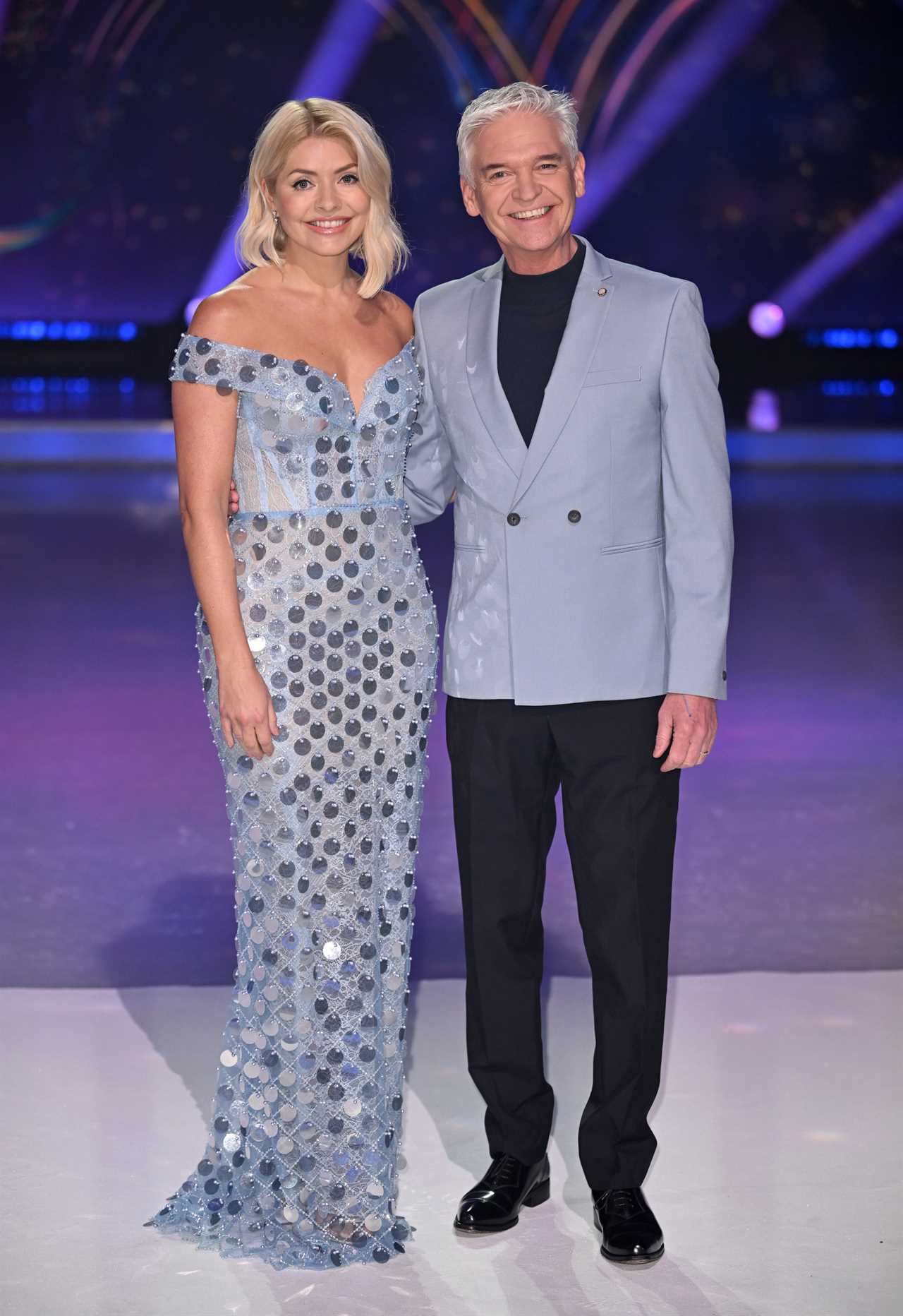 Holly Willoughby looks stunning in plunging ballgown as she returns to host Dancing on Ice