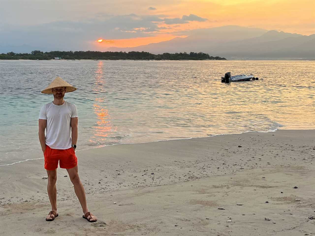 Hunky BBC weatherman drives fans wild as he poses topless on Bali beach and shows off rock-hard abs