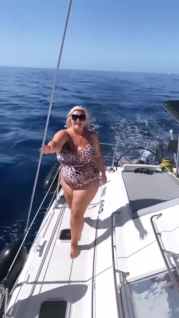 Gemma Collins dances in a leopard print one piece on a yacht in throwback joking she’s ‘auditioning for White Lotus’