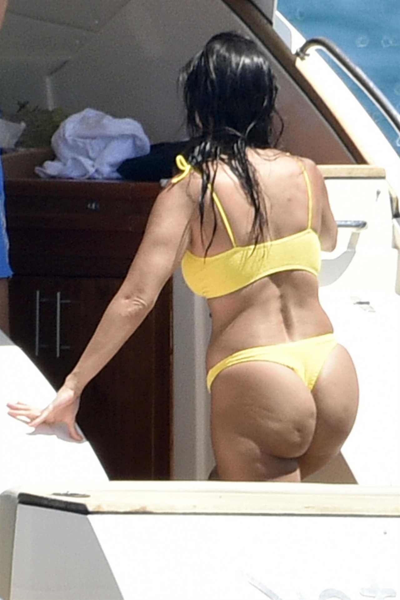 Kardashian fans praise Kourtney’s real butt and thighs with cellulite in thong bikini in ‘refreshing’ unedited photos