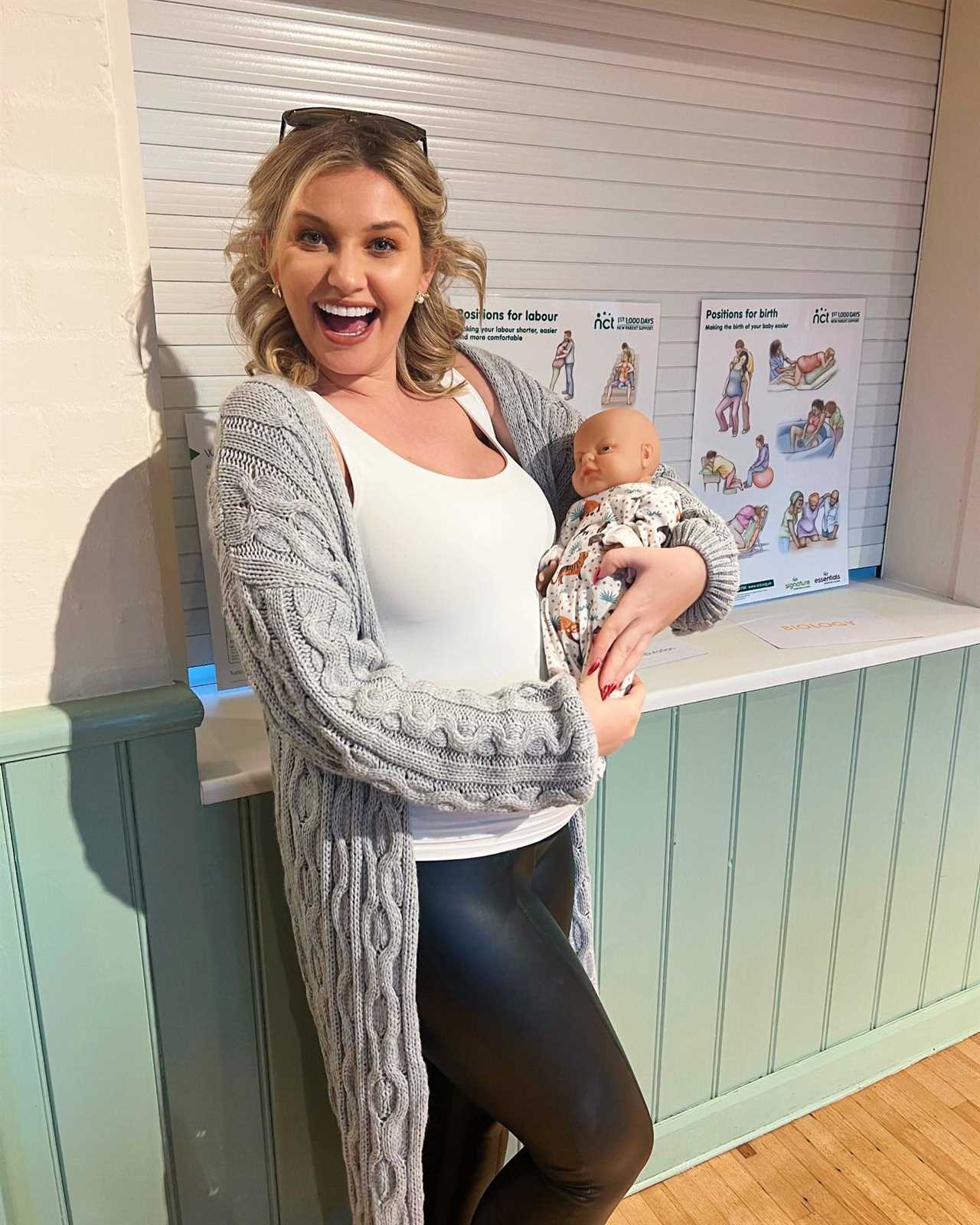 Love Island’s Amy Hart keeps fans guessing by posing with ‘baby’ as she prepares to welcome first child