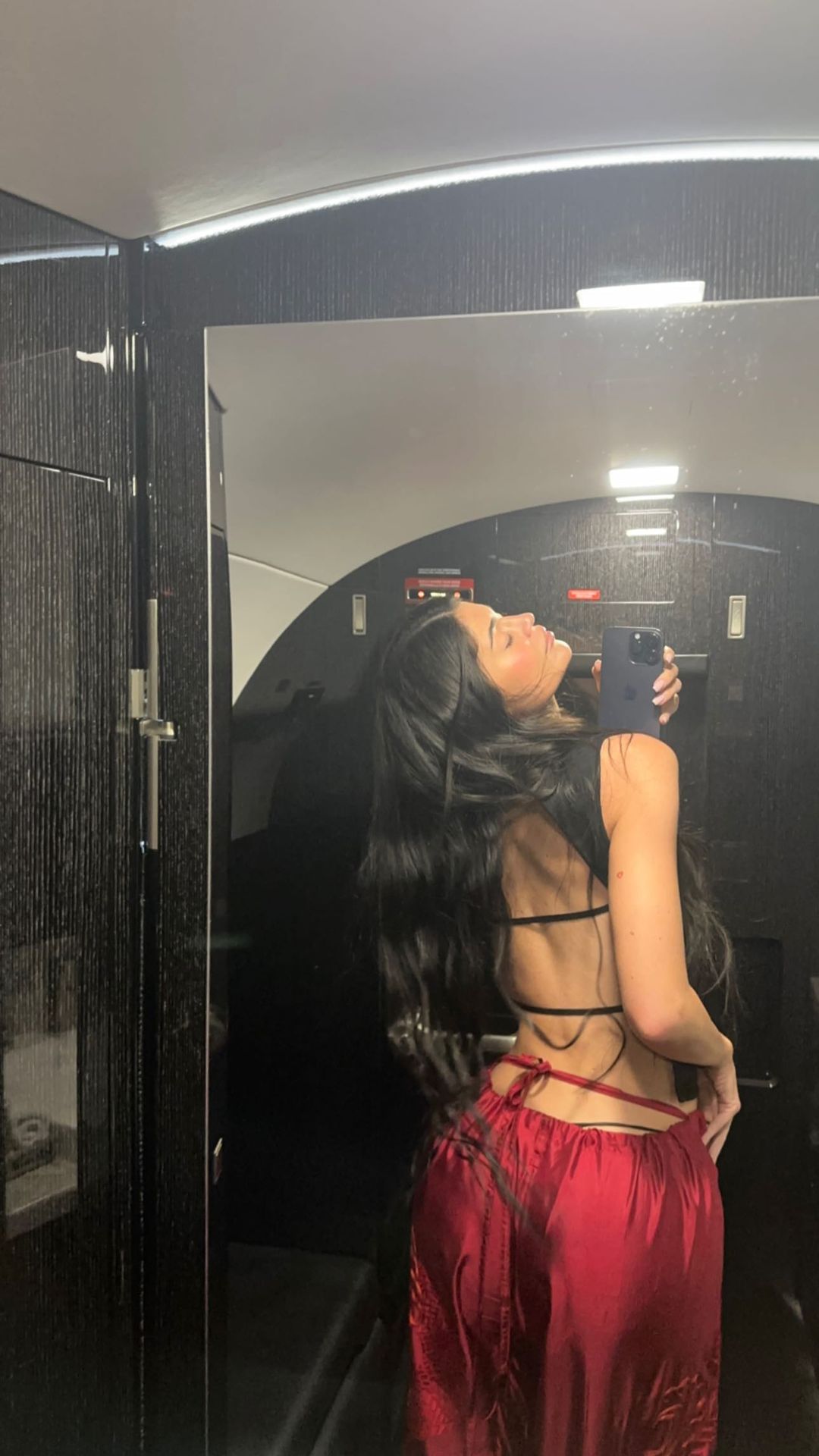 Kylie Jenner shows off thong underwear and flaunts her tiny waist in cut-out top for new photo