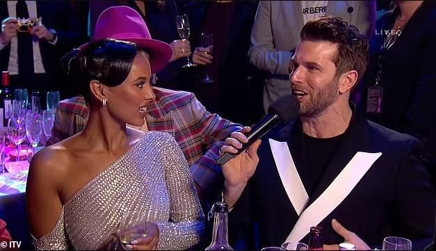 Masked Singer star Joel Dommett shocks Maya Jama with very crude Elton John joke at the Brits