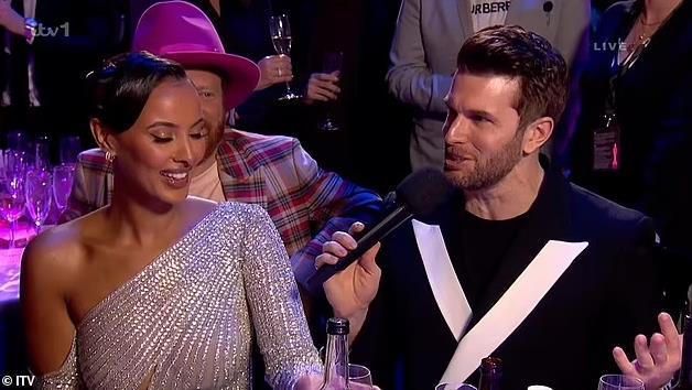 Masked Singer star Joel Dommett shocks Maya Jama with very crude Elton John joke at the Brits