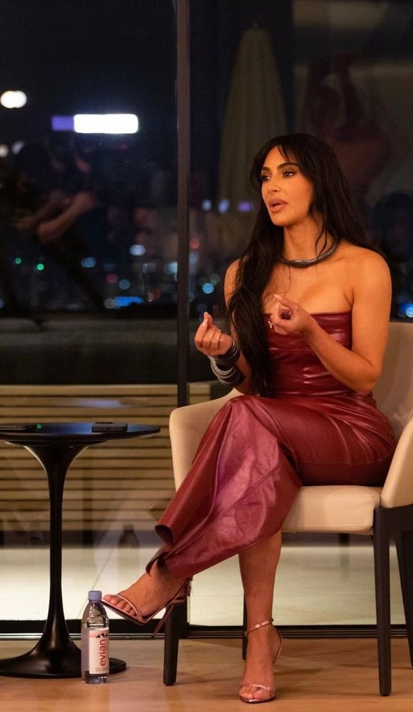 Kim Kardashian’s frail frame drowns in pink leather dress as she reveals new bangs at prison reform event in LA