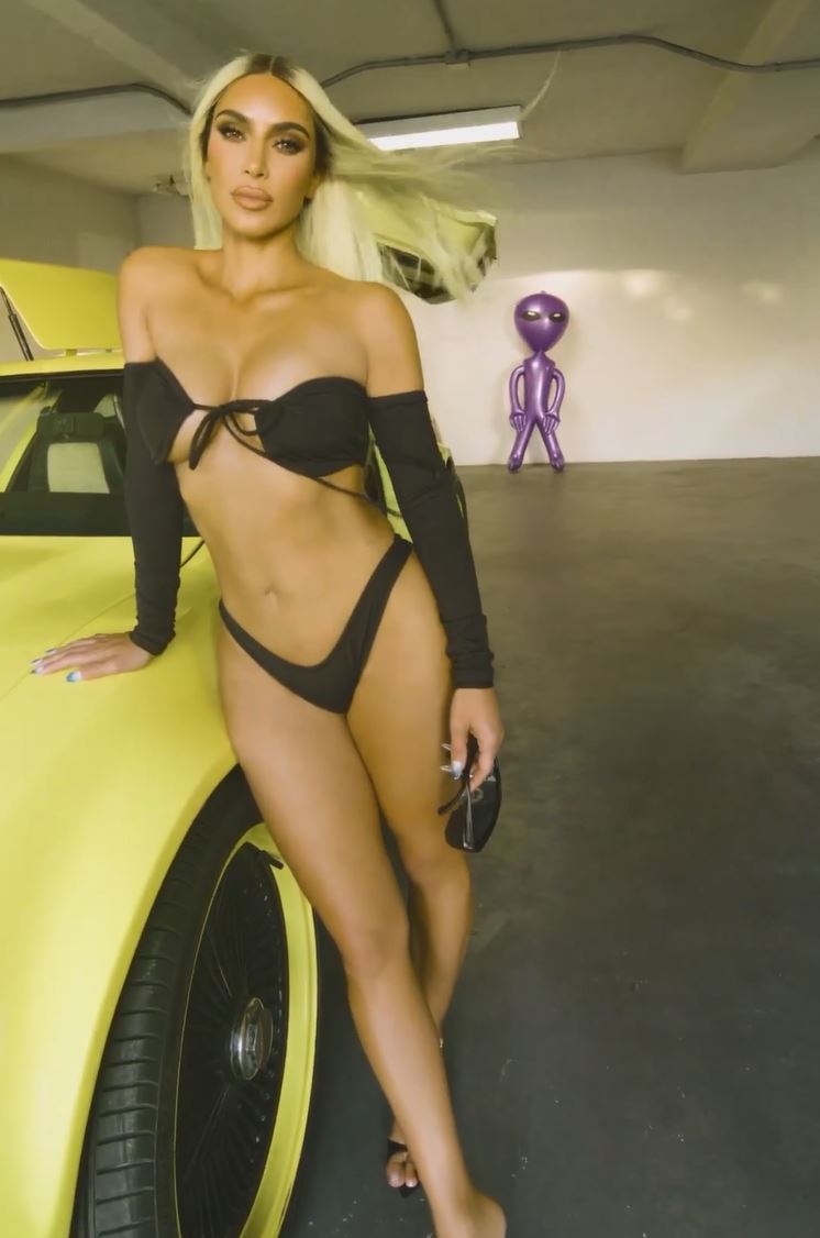 Kim Kardashian posts then deletes jaw-dropping new video showing off her underboob in very tiny Skims swim bikini top