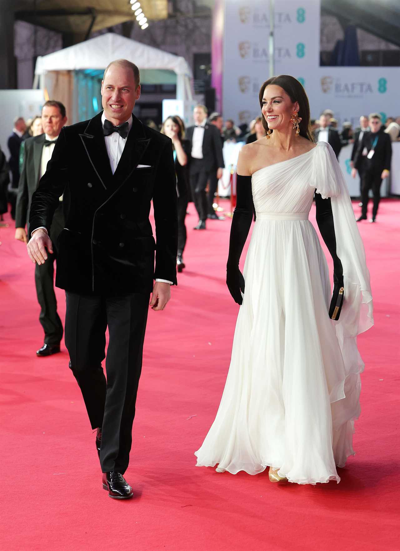 Princess Kate dazzles in chic white gown and statement Zara earrings she joins Prince William on Bafta red carpet