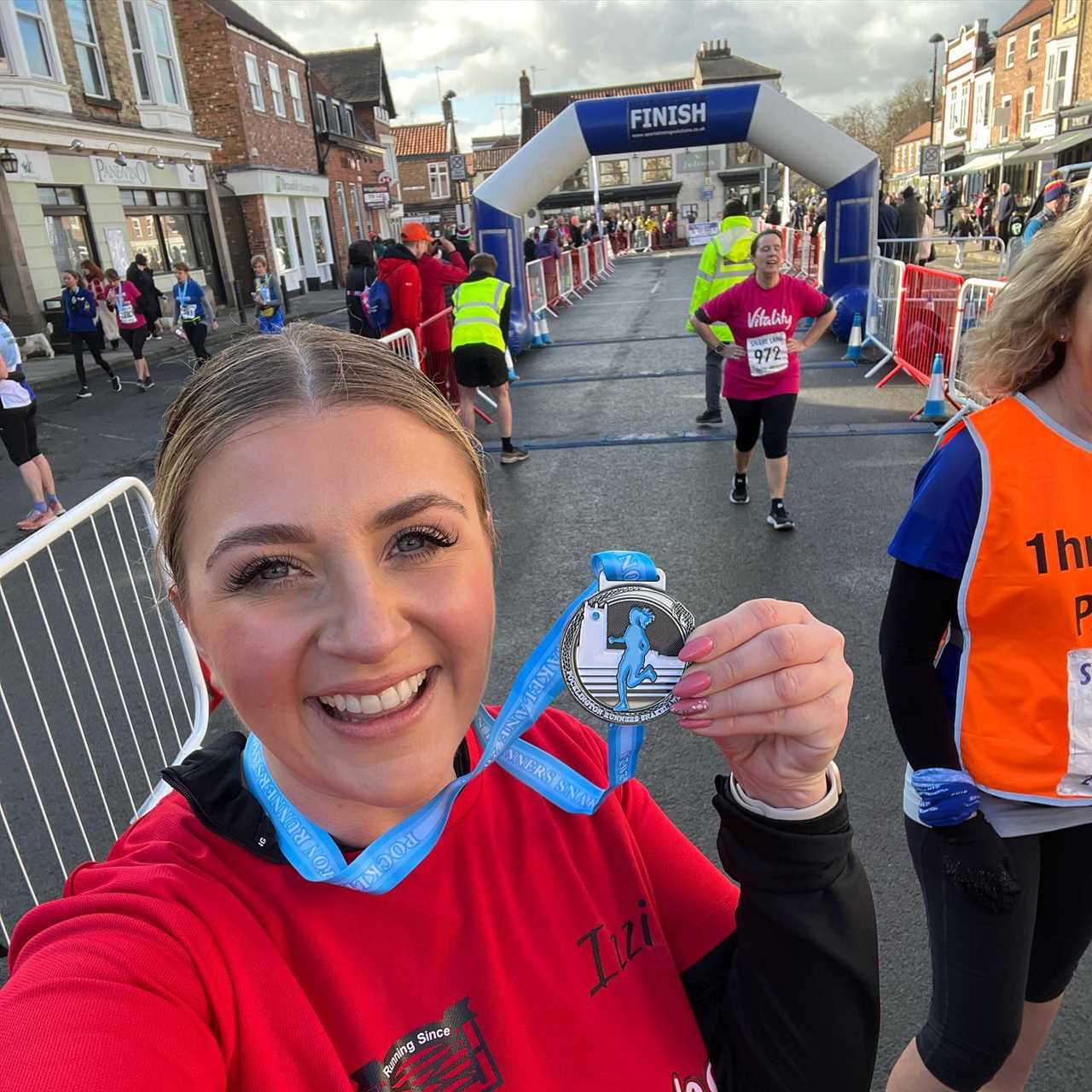 Gogglebox’s Izzi Warner looks worlds away from the sofa as she completes 10 mile run