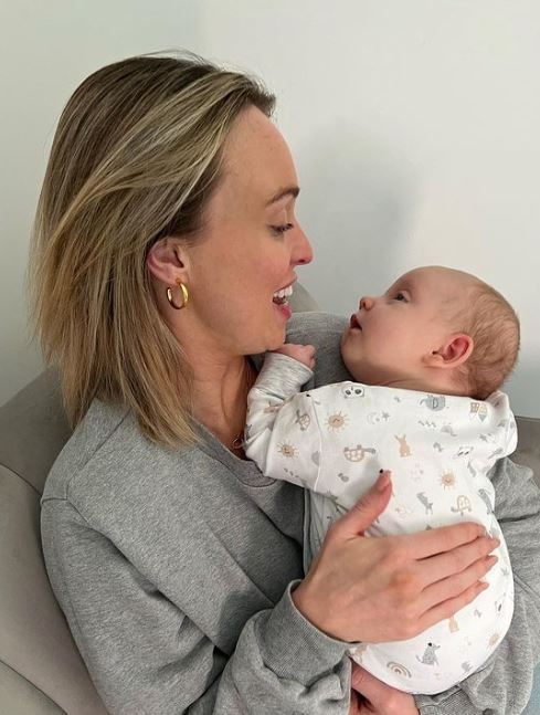 Jorgie Porter gives rare look inside her huge home as she poses with baby Forest in all-white outfit