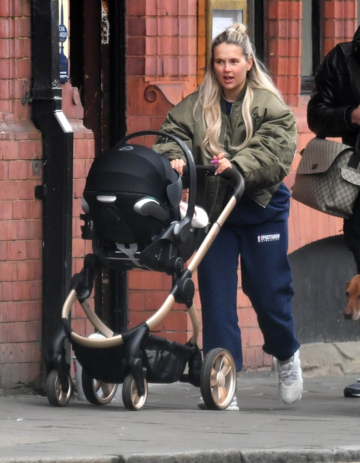 Molly-Mae Hague looks glam with Tommy Fury as they head out with six week old daughter Bambi