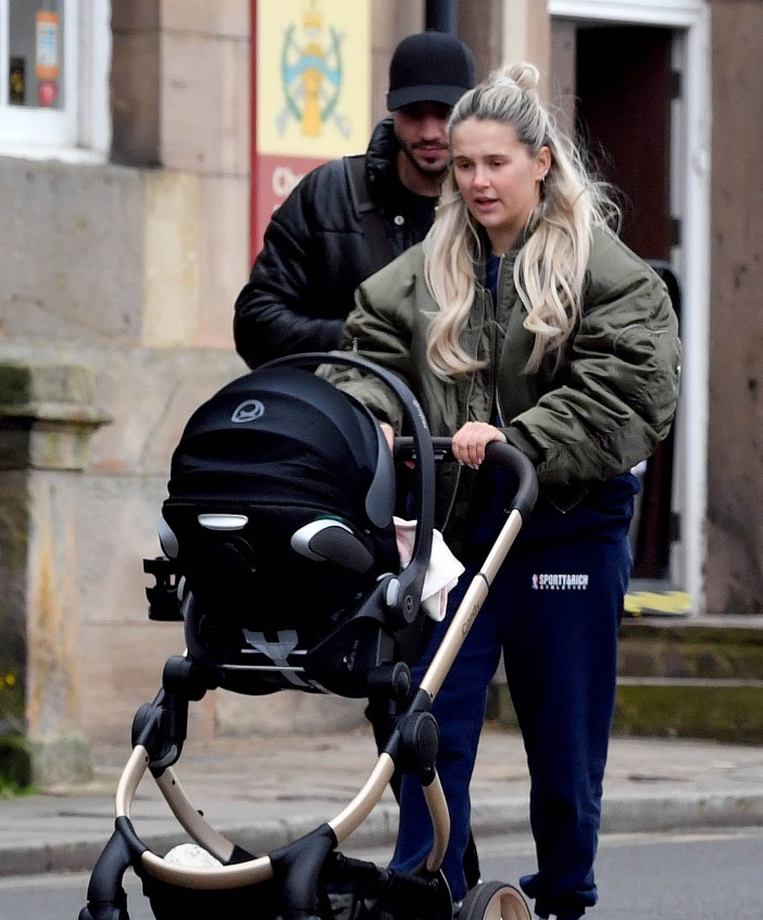 Molly-Mae Hague looks glam with Tommy Fury as they head out with six week old daughter Bambi