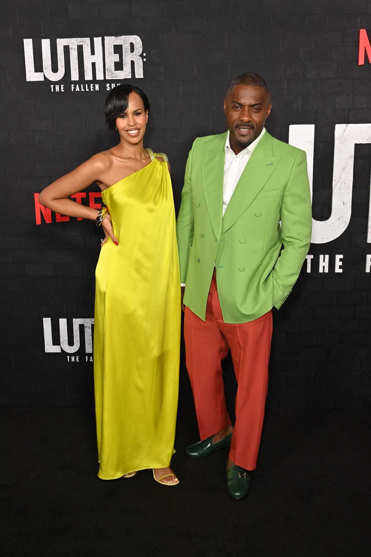 Idris Elba and wife Sabrina dazzle in bright outfits at premiere of Luther: The Fallen Sun