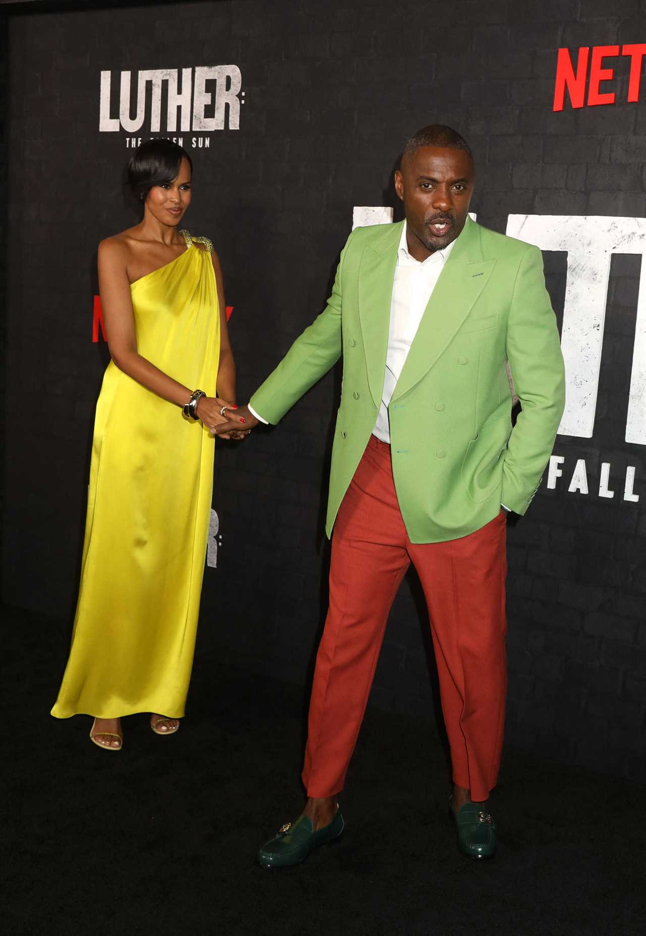 Idris Elba and wife Sabrina dazzle in bright outfits at premiere of Luther: The Fallen Sun