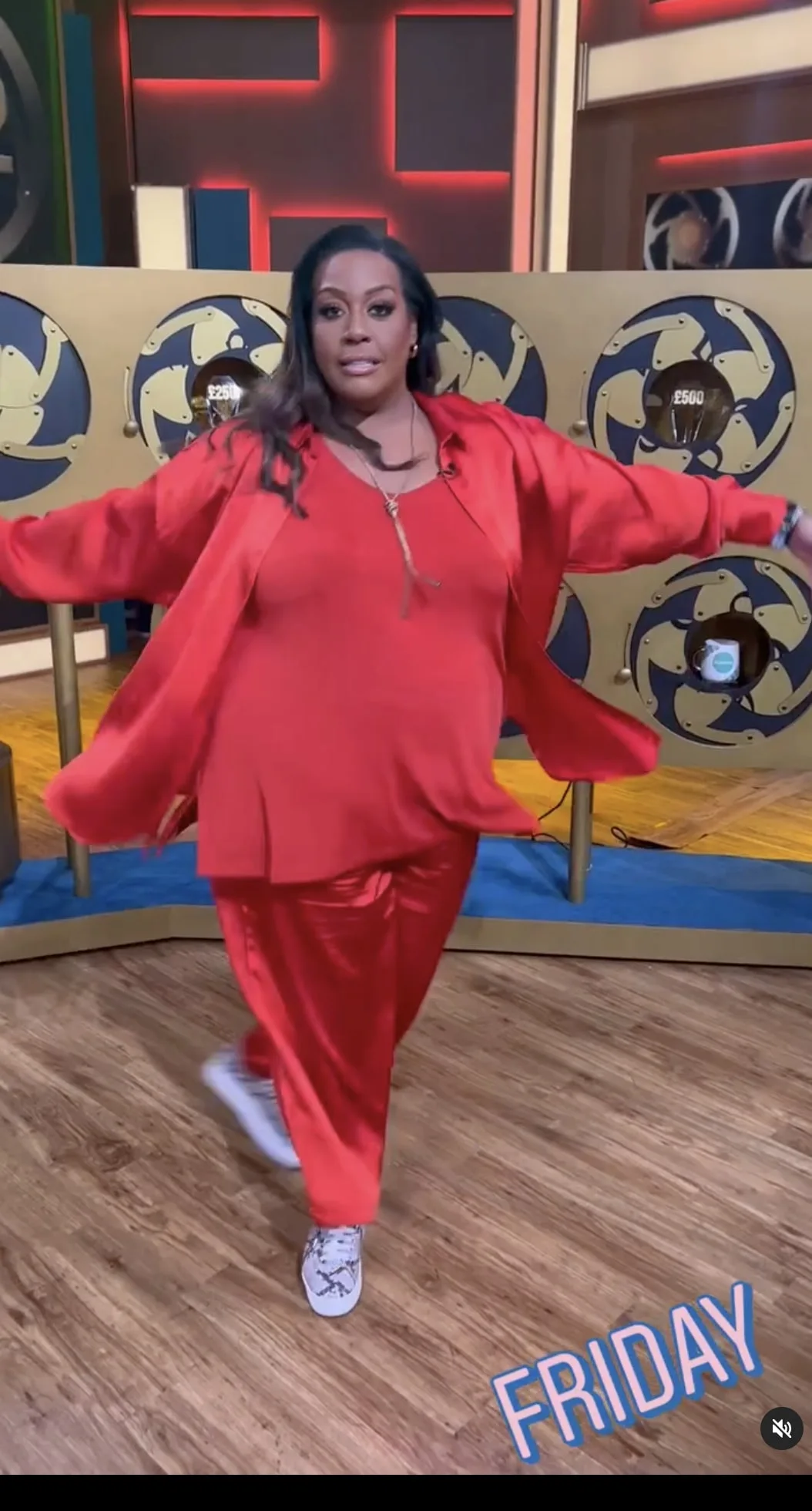 Alison Hammond shows off incredible weight loss in red silk outfit as she boogies with Dermot