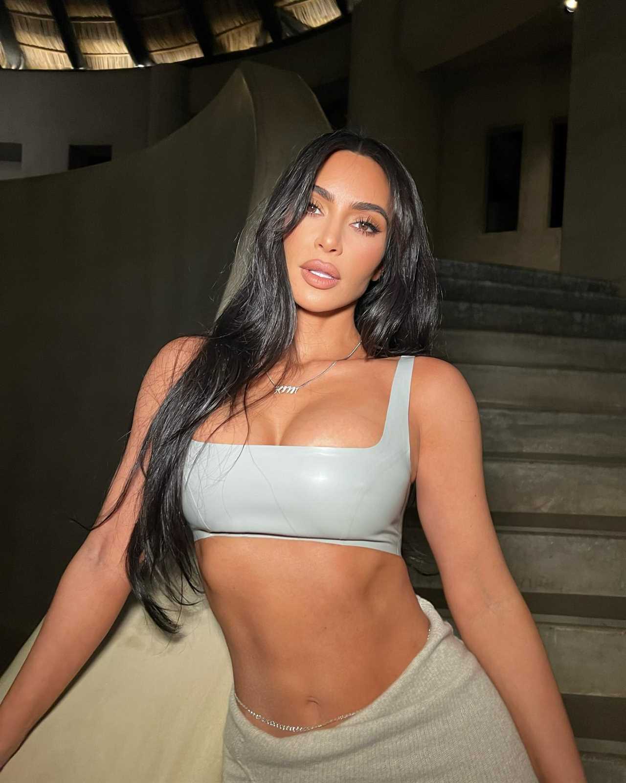 Kim Kardashian shows off her curves in see-through lace dress for sexy pic after fans claim she got ‘secret procedure’