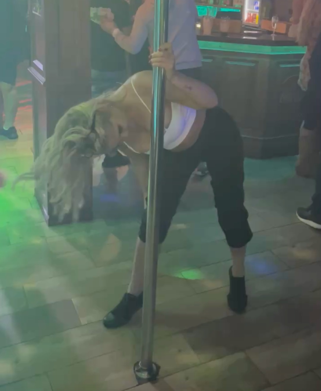 Watch as Danniella Westbrook shows off her sexy pole dancing moves on night out in Portugal