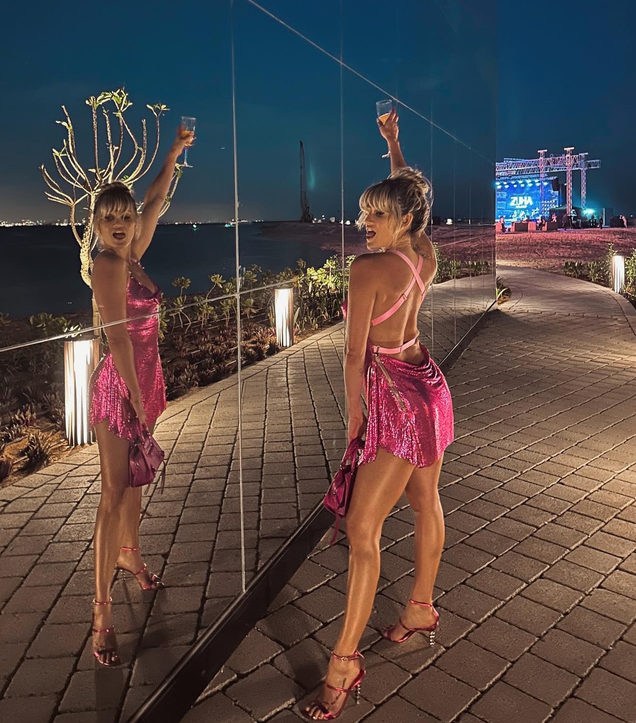 Ashley Roberts stuns in tiny pink mini-dress as she shares unseen pics of Dubai holiday