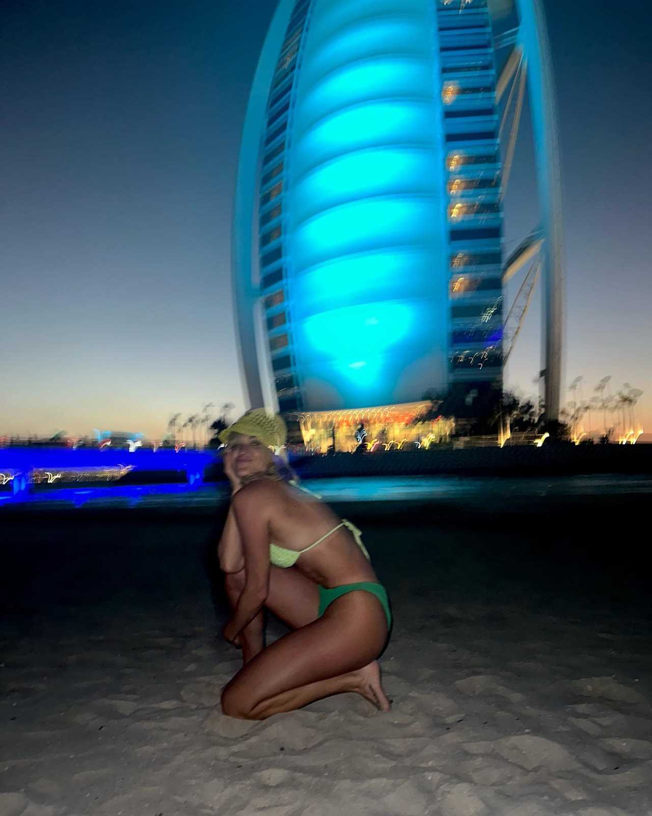 Ashley Roberts stuns in tiny pink mini-dress as she shares unseen pics of Dubai holiday