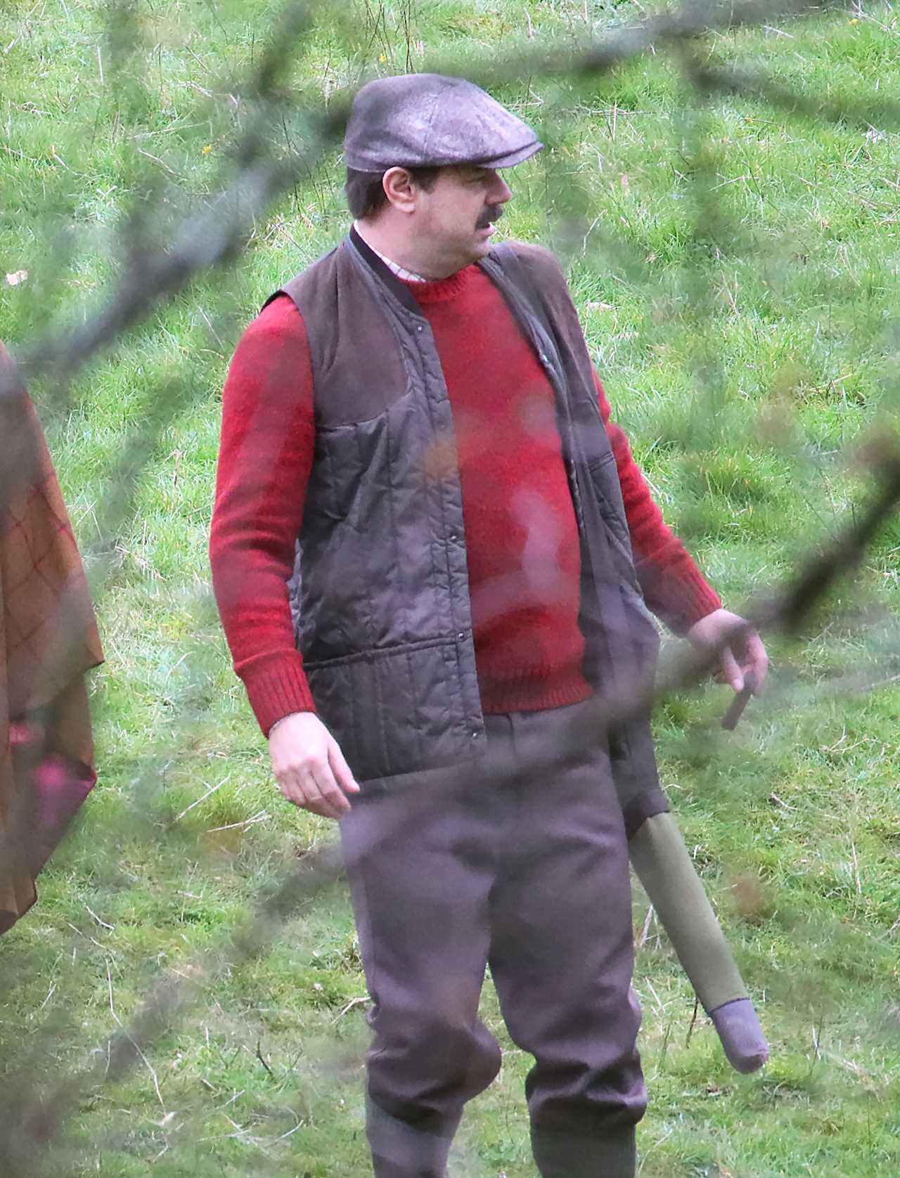 TV and film legend looks unrecognisable as he films scenes for new Disney+ show with glam Emily Atack
