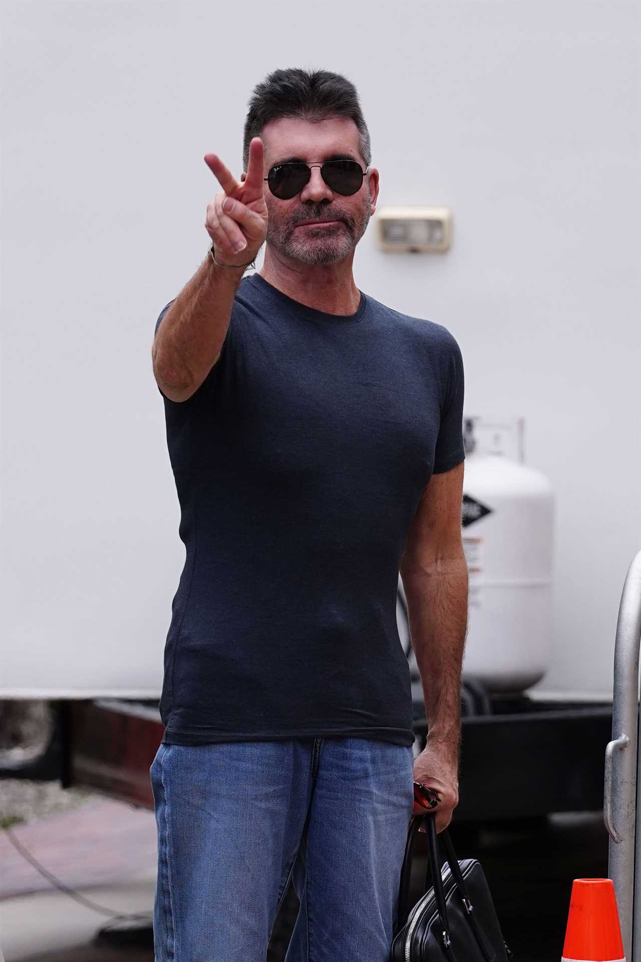 Simon Cowell looks slimmer than ever in tight T-shirt and shades as he heads to filming on America’s Got Talent