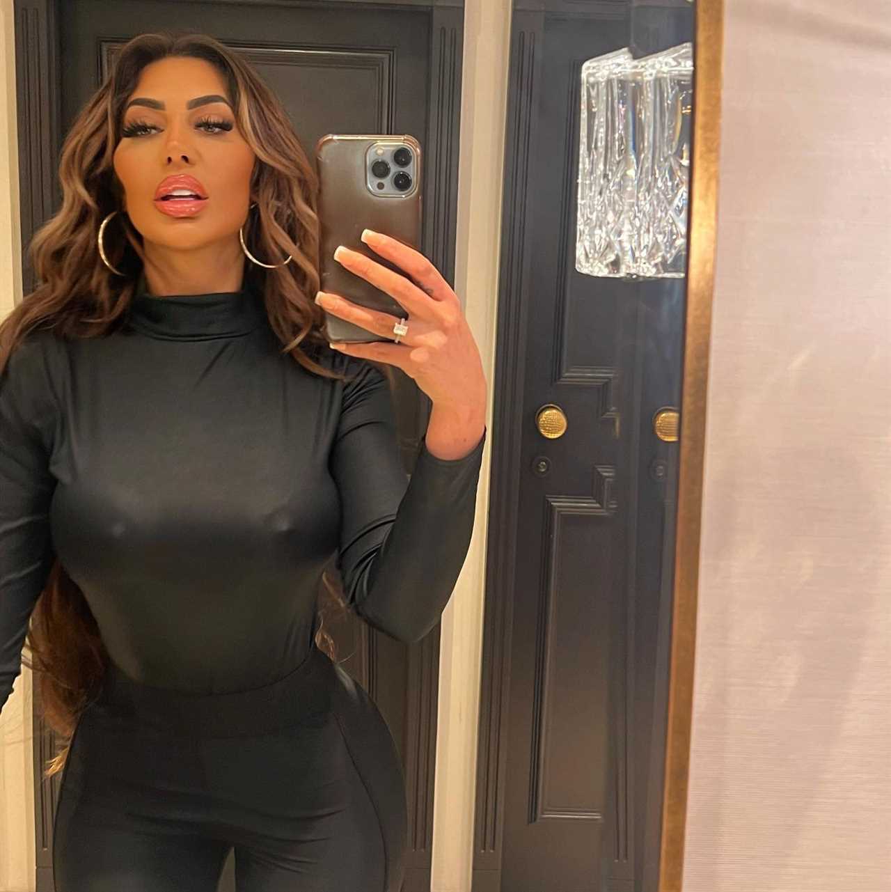 Chloe Ferry is feeling nippy as she goes braless in skintight leather top