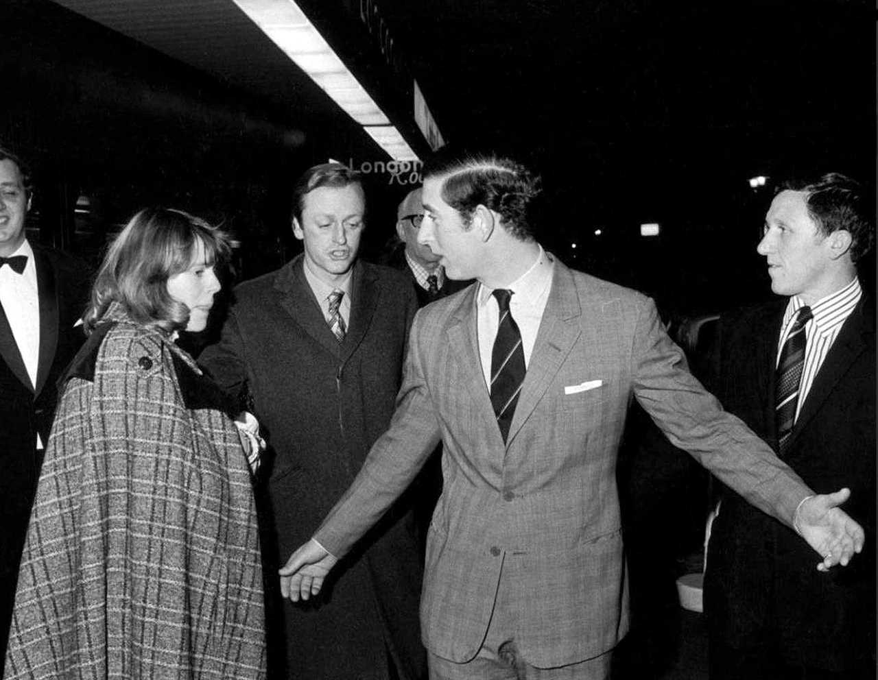 Mandatory Credit: Photo by Press Portrait Service/Shutterstock (225294d) Prince Charles with Andrew and wife Camilla Parker Bowles leaving the Royal Opera House on 14 Feb 1975 PRINCE CHARLES AND CAMILLA PARKER BOWLES 1975