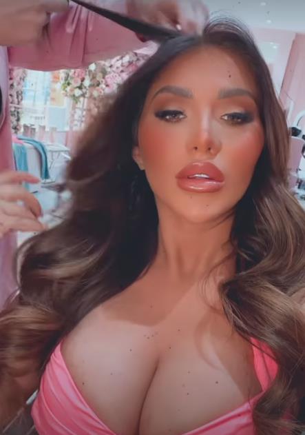 Towie’s Chloe Brockett shows her famous exes what they’re missing as she glams up in low-cut pink top