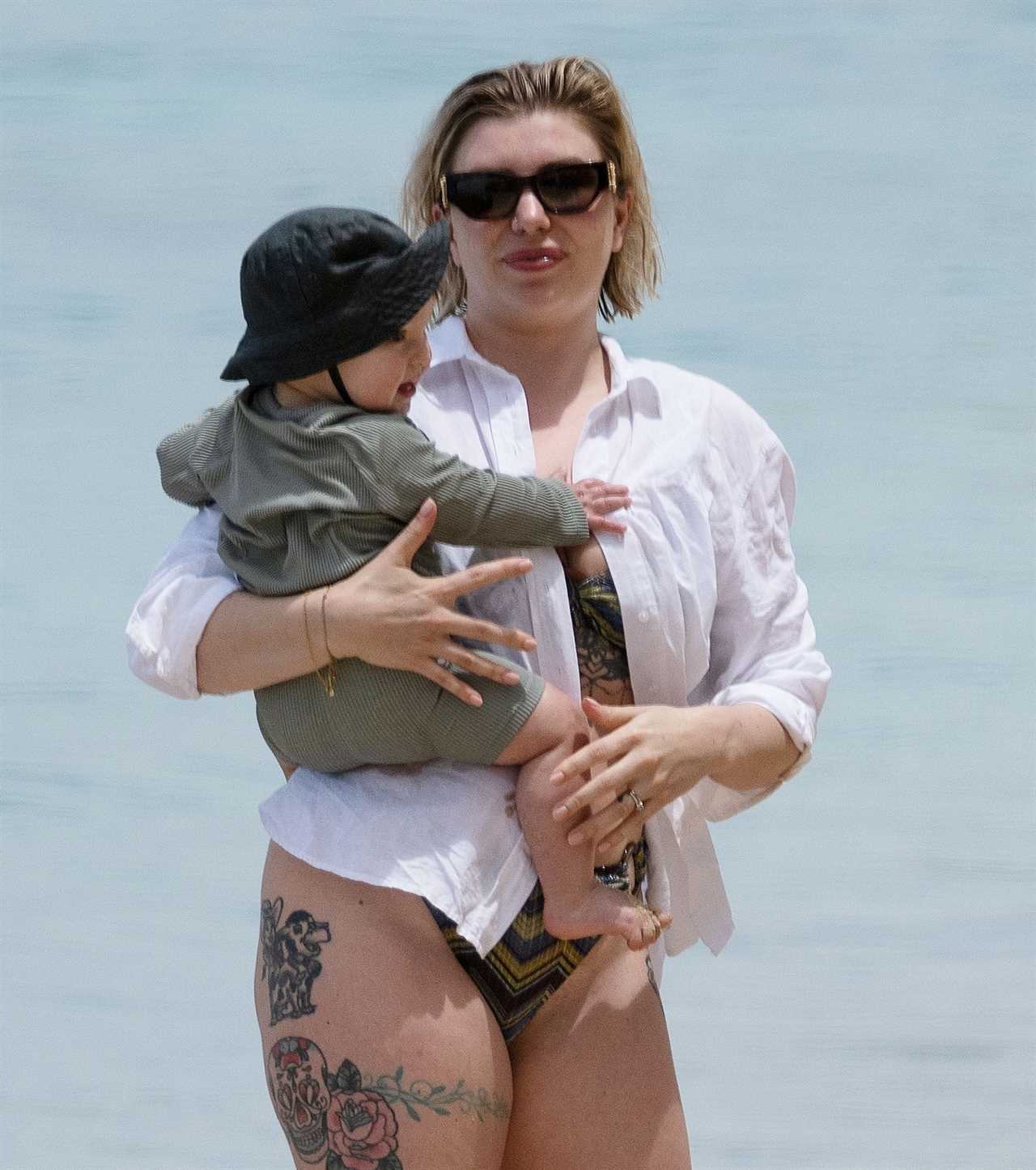 Olivia Bowen looks amazing in new plunging bikini as she hits the beach again on holiday with hubby Alex and son Abel