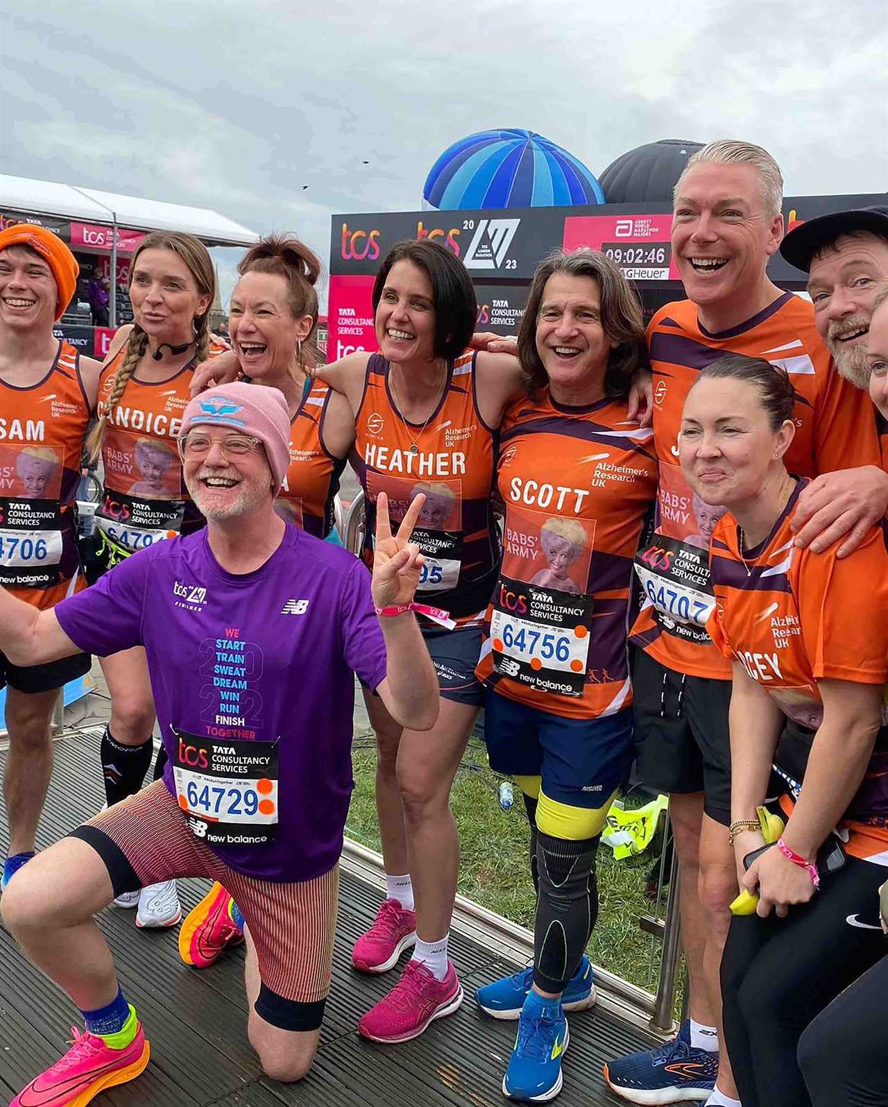 EastEnders star Lacey Turner breaks down in tears as she hugs her husband and daughter after emotional London Marathon