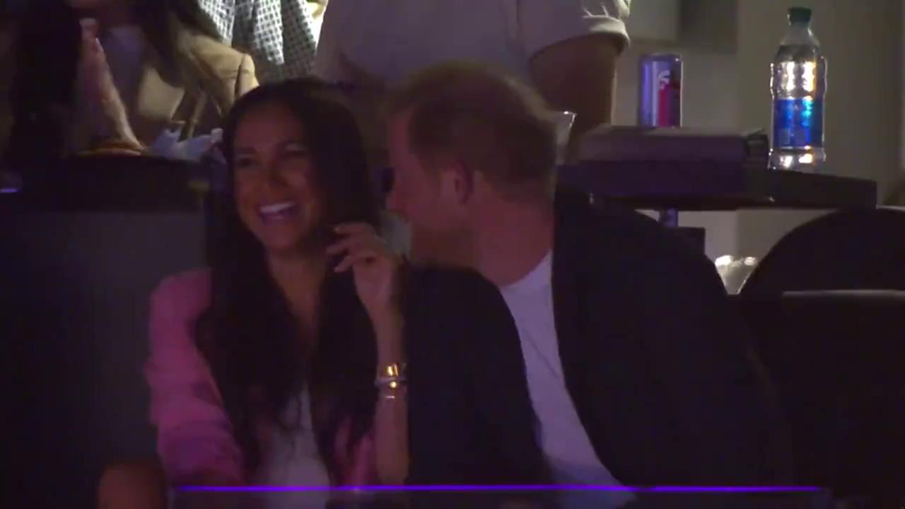 Meghan Markle and Prince Harry giggle and pull faces at Lakers basketball game after coronation snub