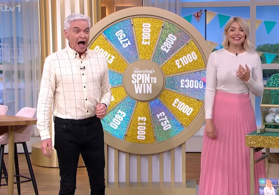 This Morning in chaos as Spin to Win superfan breaks down in tears after winning £3,000 and screams at Holly and Phil